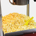 fully popped popcorn on a 1911 original 8 ounce popcorn machine